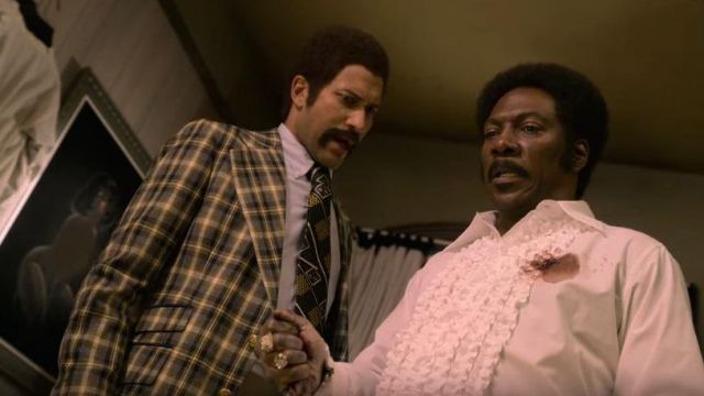 Blacks and yellow plaid tie worn by Jerry Jones (Keegan-Michael Key) in Dolemite Is My Name