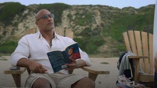 Elizabeth Warren, the This Fight Is Our Fight Book on the Beach used by Spencer Strasmore (Dwayne Johnson) in Ballers (S05E01)