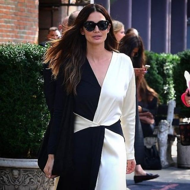 The Row bindle double knots suede shoulder bag worn by Lily Aldridge New York September 9, 2019