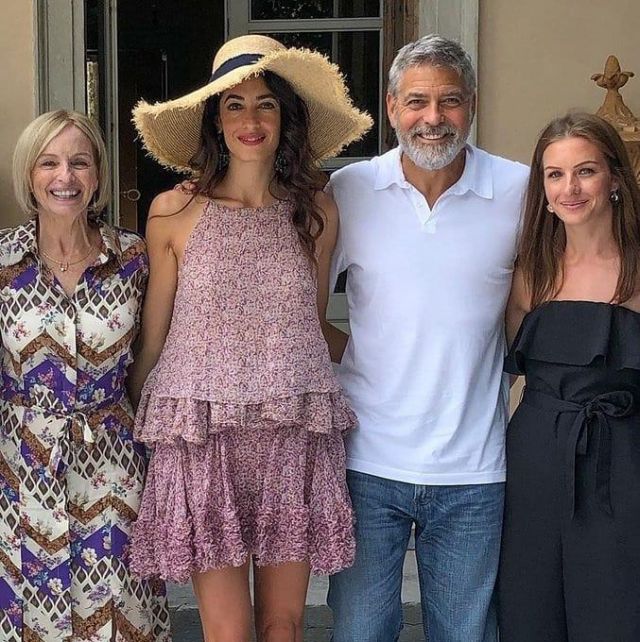 Stella McCartney ditzy floral crinkled silk mini skirt worn by Amal Clooney Villa Oleandra in Italy September 7, 2019