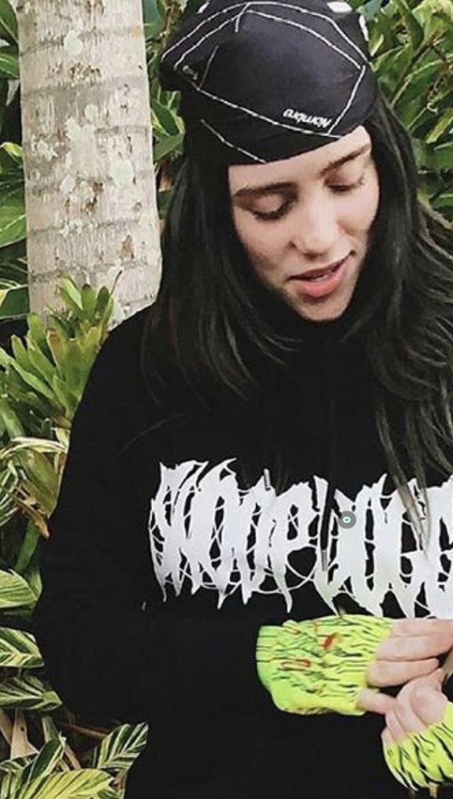 The gloves skeletons by Skoot Apparel worn by Billie Eilish on a post-Instagram