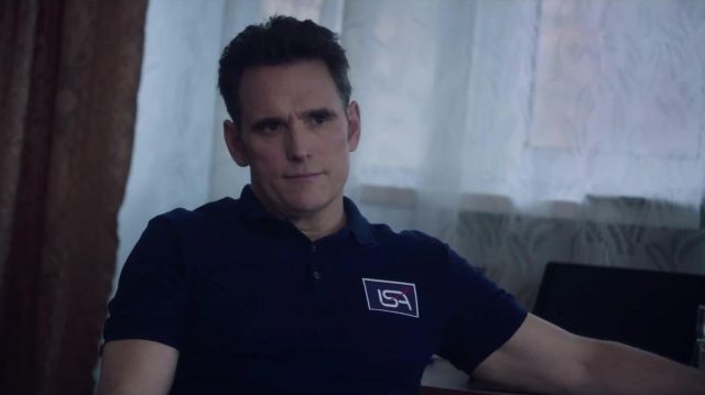 Navy polo shirt worn by (Matt Dillon) in Proxima