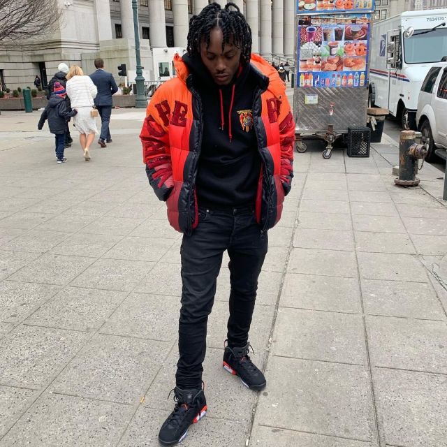 Vie Riche Orange jacket worn by Kooda B on the Instagram account @koodab_foa