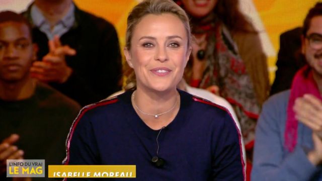 The blue sweater striped red and white Isabelle Moreau in The Info of the true 04.10.2019