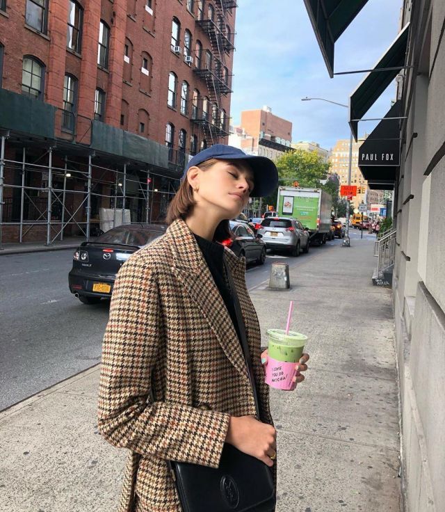 Polo Ralph Lauren houndstooth double breasted wool & nylon trench coat worn by Kaia Jordan Gerber New York October 9, 2019