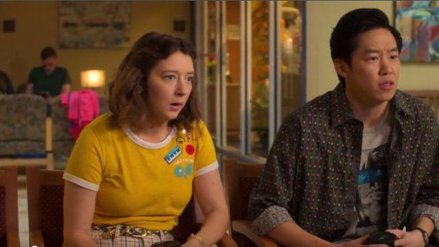 Yellow and White Tennis Racket “Table for Two” Print Ringer Tee worn by Nonnie Thompson (Kimmy Shields) in Insatiable Season 02 Episode 03