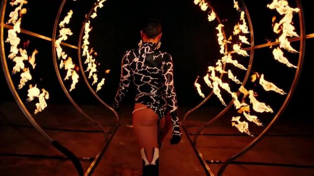 Black and gold rhinestone bodysuit worn by Anitta in DJ Snake, Sean Paul,  Anitta - Fuego ft. Tainy