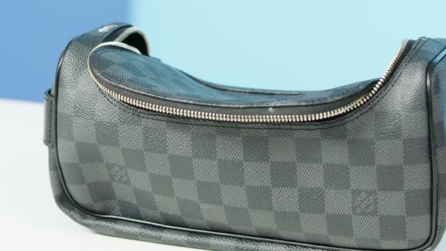 Louis vuitton Toiletry Bag worn by GQ in the  video 10