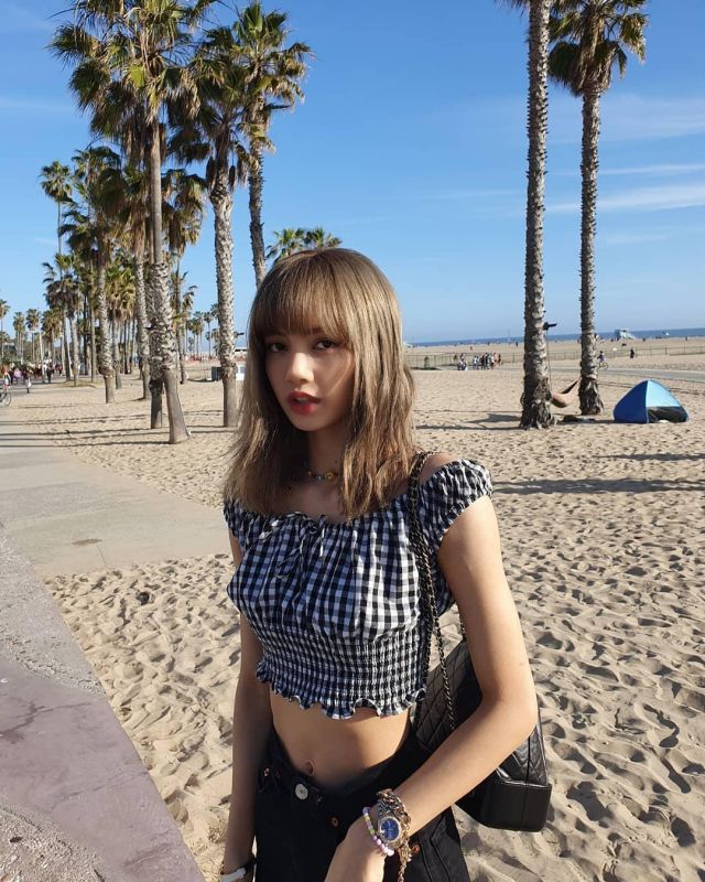 The top checkered white and black Brandy Melville Lisa's account on the Instagram of @lalalalisa_m