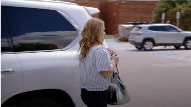 Stella McCartney Argent Sac à main porté par Brandi Redmond dans Le Real Housewives of Dallas Saison 04 Épisode 09