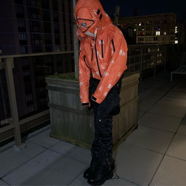 TAKAHIROMIYASHITA TheSoloist. Orange Printed Tyvek Shell Hooded Jacket of Lil Uzi Vert on the Instagram account @liluzivert
