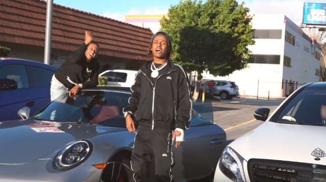 Amiri black logo embroidered leather trim bomber jacket of Rich the Kid in the music video Rich The Kid - 4 Phones [Official Music Video]