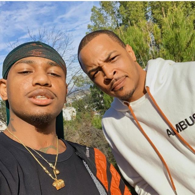 Ambush White logo print hoodie of T.I. on the Instagram account @troubleman31