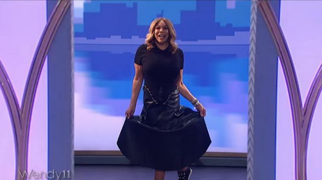 Apt. 9 + Cara Santana Black Leather Asym­met­ri­cal Skirt worn by Wendy Williams on The Wendy Williams Show November 11, 2019