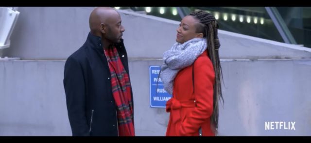 The scarf is striped in scope by Rashon 'Rush' Williams Romany Malco in the movie the Holiday Rush 