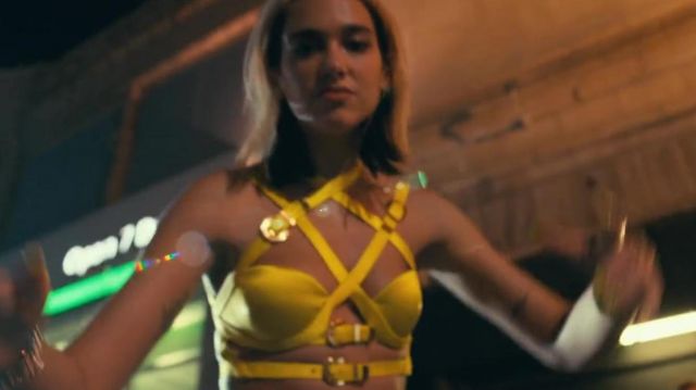 Yellow strappy harness of Dua Lipa in Dua Lipa - Don't Start Now (Official Music Video)