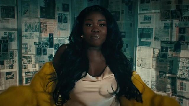 Yellow fuzzy coat of Vickeelo in Megan Thee Stallion x VickeeLo – Ride Or Die [Official Video]