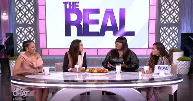 Eloquii Faux Leather Jump­suit worn by Loni Love on The Real November 19,2019