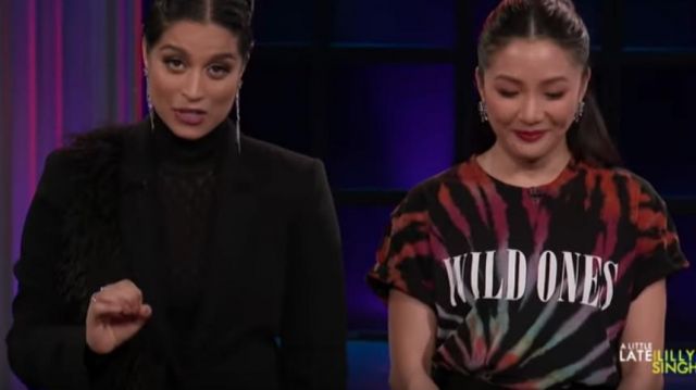 Amiri Wild Ones print­ed tie-dyed cot­ton-jer­sey T-shirt worn by Lilly Singh on A Little Late with Lilly Singh November 19, 2019
