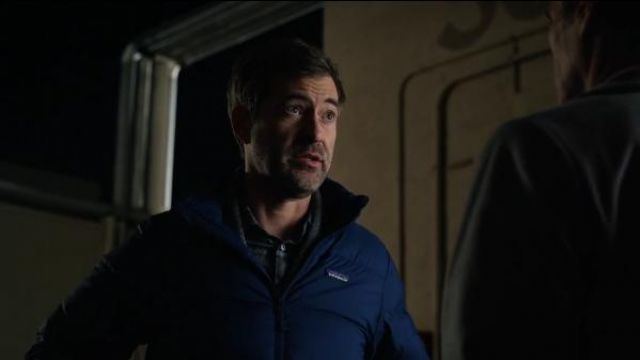 Patagonia Blue Puff Hood­ed Jack­et worn by Chip Black (Mark Duplass) in The Morning Show Season01 Episode06