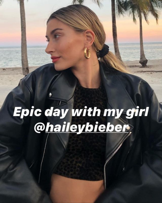 Celine Cus­tom Cropped Bik­er Jack­et worn by Hailey Baldwin With Zoey Grossman November 27, 2019