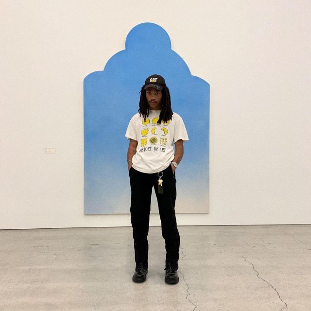 The white t-shirt with the smiley face worn by Luka Sabat on his account Instagram @lukasabbat