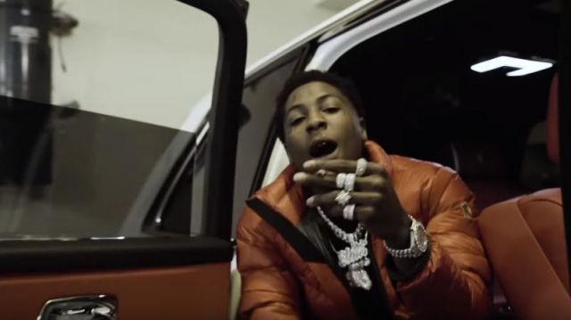 Moncler grenoble Red Can­more Down Jack­et of YoungBoy Never Broke Again in the music video nba youngboy - Bring 'Em Out (Official Video)