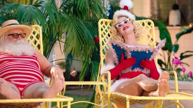Cat eye white sunglasses worn by Katy Perry in her Cozy Little Christmas music video
