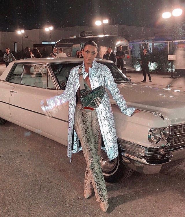 Dior Sad­dle Python Bag worn by Kim Kardashian Dior Fashion Show December 3, 2019
