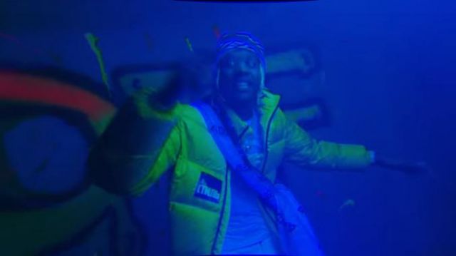 Heron Preston Yel­low Puffer Jack­et of Lil Durk in the music video Lil Durk - Blika Blika (Official Music Video)