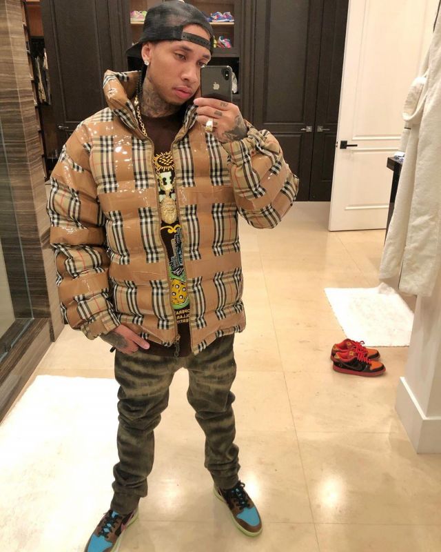 Burberry Checked Down Jack­et of Tyga on the Instagram account @tyga