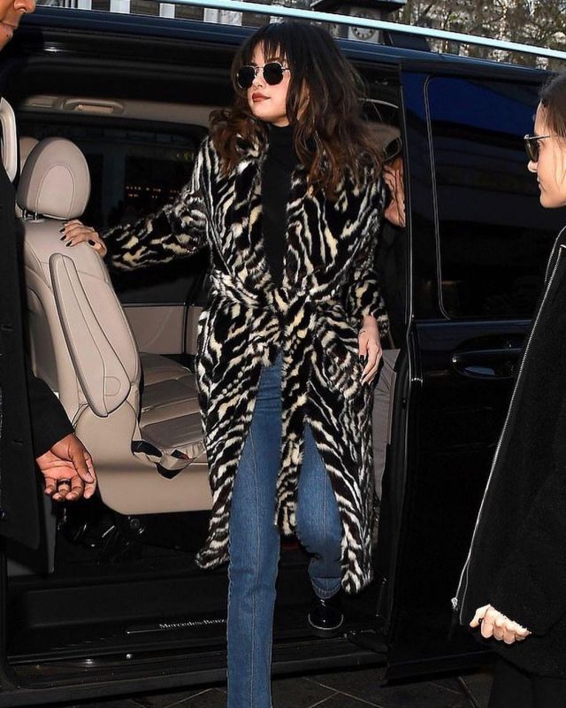 Mango Belt­ed Faux Fur Coat of Selena Gomez on the Instagram account @selenagomez December 11, 2019