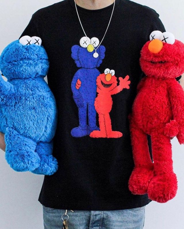 KAWS x Uniqlo x Sesame Street BFF Elmo Tee Black on the account Instagram of @stockxstreetwear
