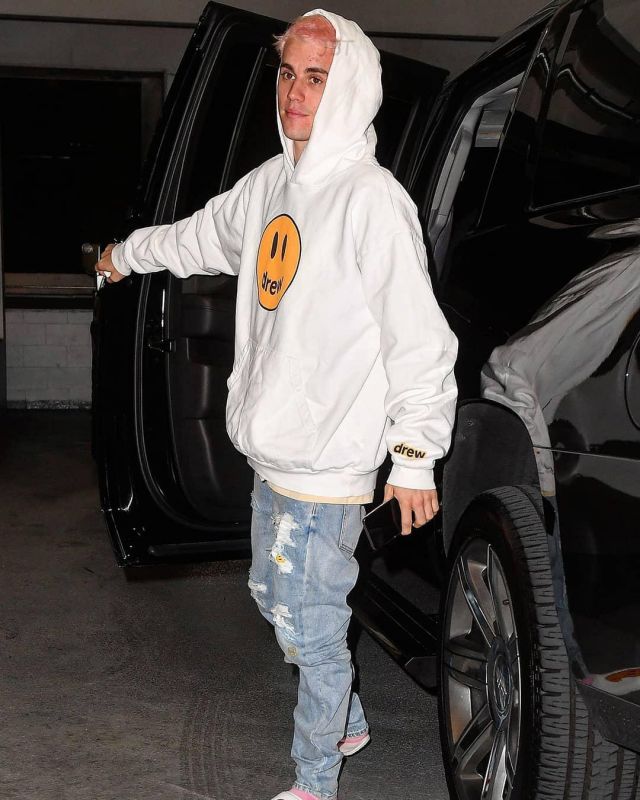 Drew House Smiley Face Hoodie worn by Justin Bieber Miami November 26, 2019