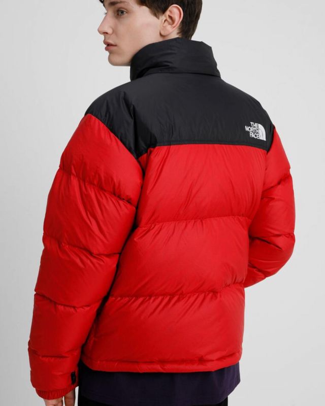 The jacket The North Face Nupste 1996 red and black on the account Instagram of @canal_street_