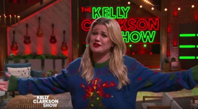 Funqi Oh Christ­mas Tree Ug­ly Christ­mas Sweater worn by Kelly Clarkson on The Kelly Clarkson Show December 16, 2019