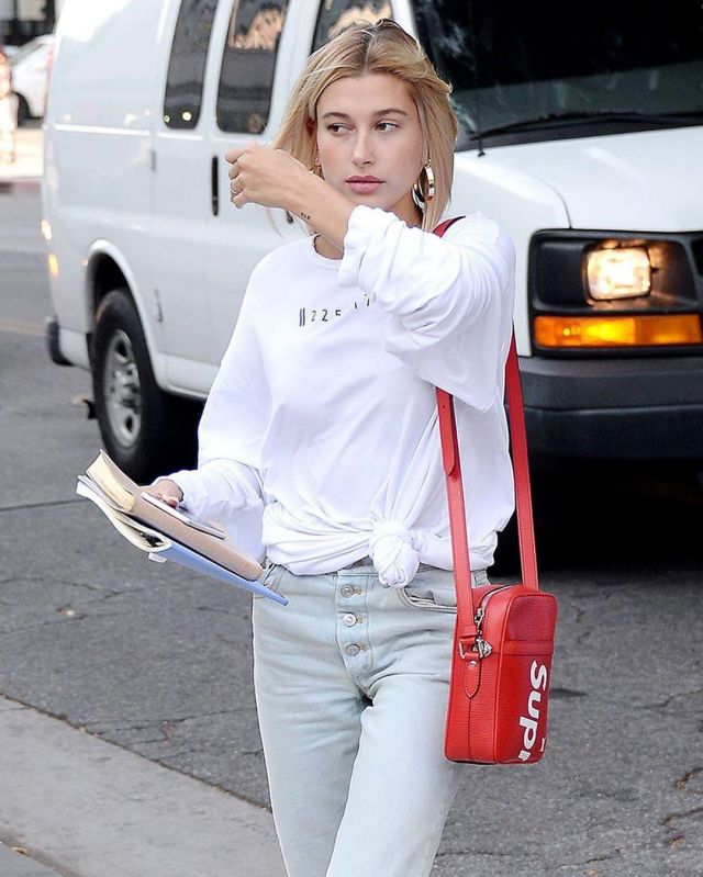 Louis Vuitton x Supreme Danube Epi PM Red worn by Hailey Baldwin on the account Instagram of @supremeskate.co