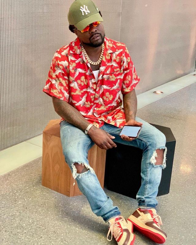 Sneakers beige, brown and red, worn by Wale on the account Instagram of ...