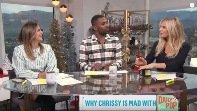 Ganni Stripe Ruf­fle Col­lar Cot­ton Poplin Blouse worn by Erin Lim on E! News December 18, 2019