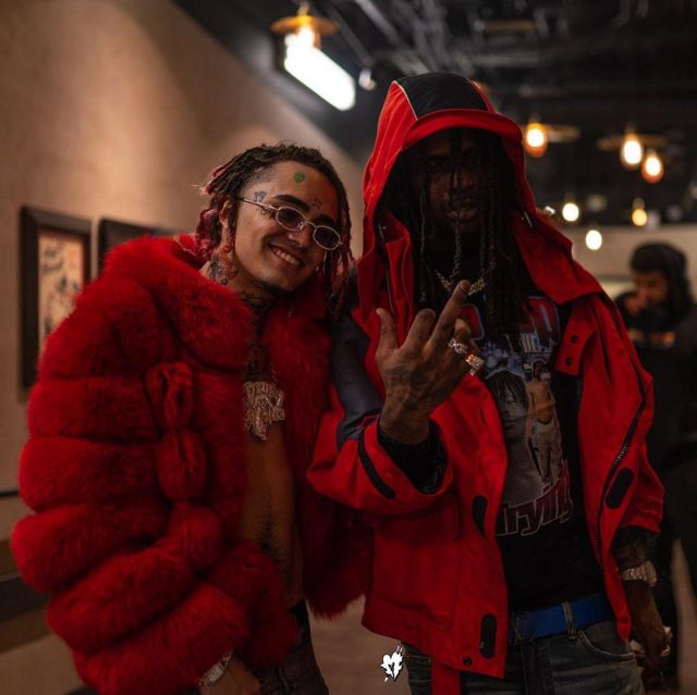 The red coat with fur worn by Lil Pump on the account Instagram of @chieffkeeffsossa