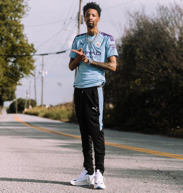 Jersey puma soccer manchester city blue and purple worn by Sonny Digital on the account Instagram of @sonnydigital