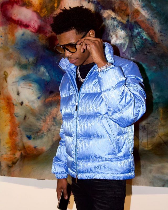 The down jacket in jacquard Dior oblique blue carried by A Boogie wit da Hoodie on the account Instagram of @artisthbtl