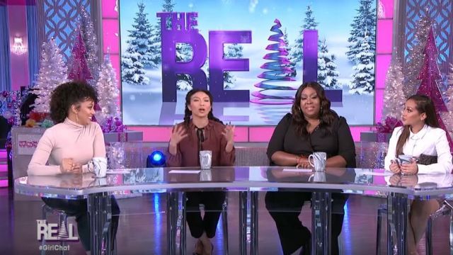 Calvin klein Plus Size Sur­plice Jump­suit worn by Loni Love on The Real December 22, 2019