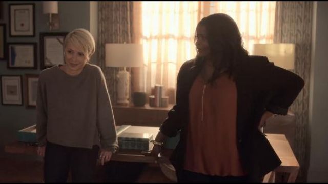 Red V-Neck Blouse worn by Poppy Parnell (Octavia Spencer) in Truth Be Told Season 1 Episode 5