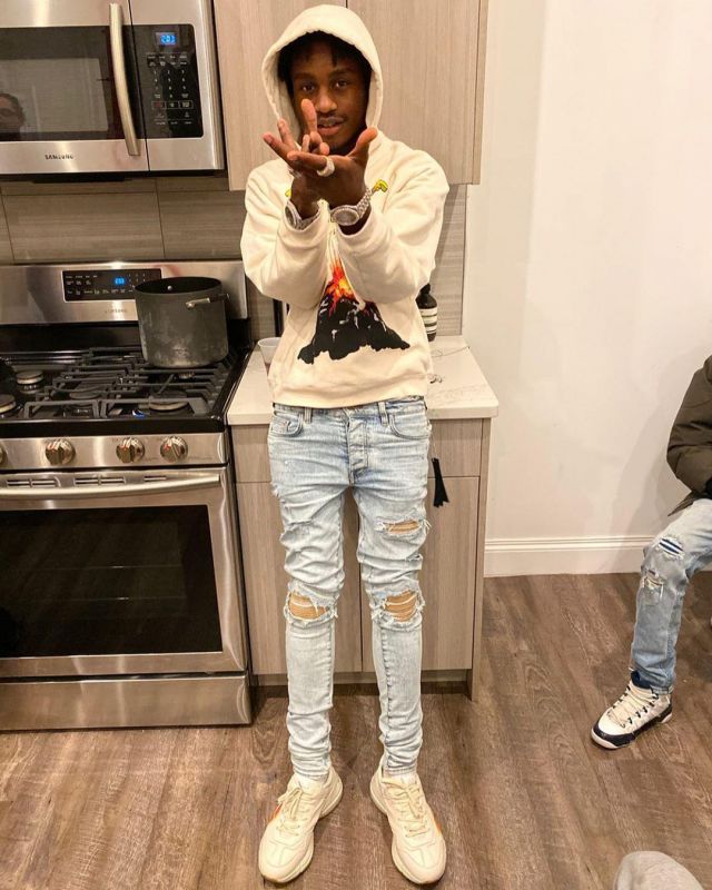 Gucci Print 'Rhy­ton' Sneak­ers of Lil Tjay on the Instagram account @liltjay