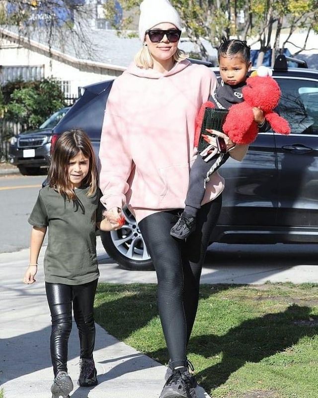 Fear of God Essentials Pink Hoodie worn by Khloé Kardashian Los Angeles ...