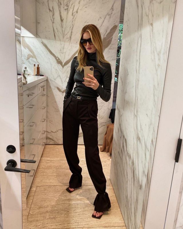 Bottega Veneta Wool Gabar­dine Wide Leg Pants worn by Rosie Huntington-Whiteley on the Instagram account @rosiehw