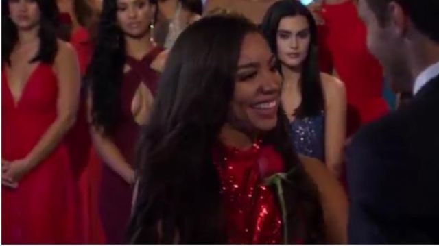 Red Se­quin Gown worn by Deandra K. in The Bachelor Season 24 Episode 1