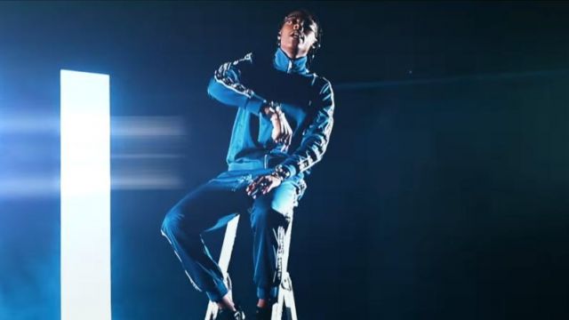 Blue jacket with stripes on the black worn by Koba LaD in the video Koba LaD - RR 9.1 feat. Niska
