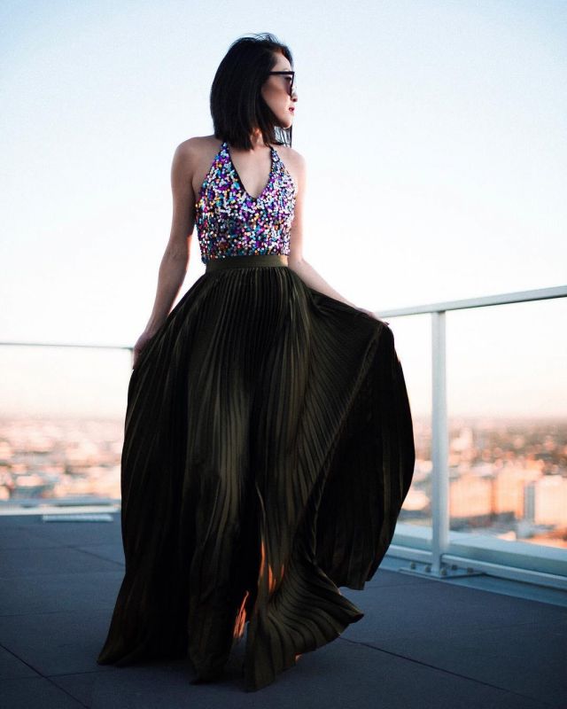 Green Pleated Skirt of Nina Hu on the Instagram account @citizensrunway